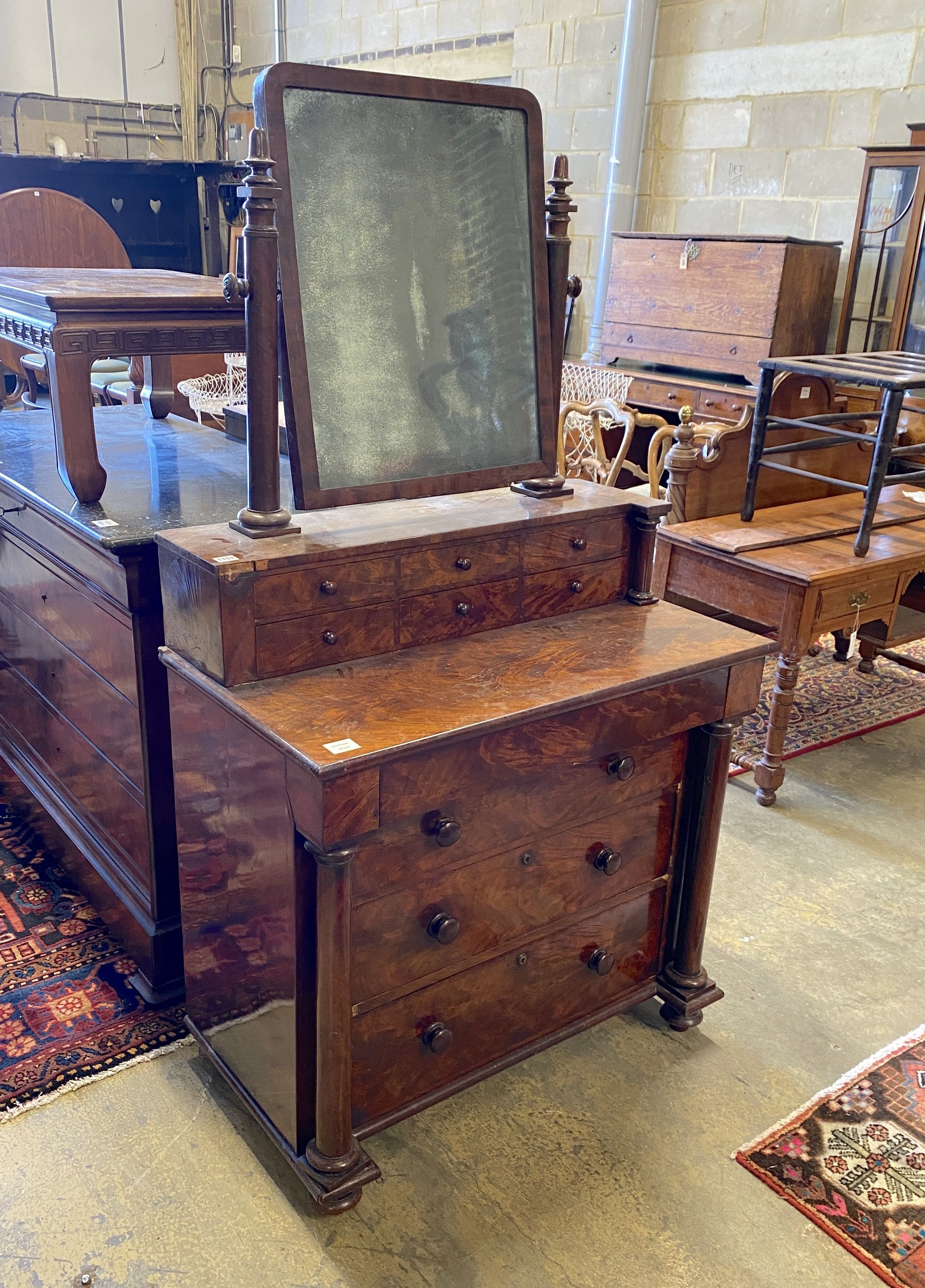 A 19th century French mahogany dressing chest, width 89cm, depth 50cm, height 165cm